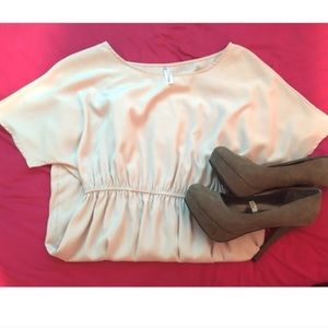 Francesca’s nude color dress